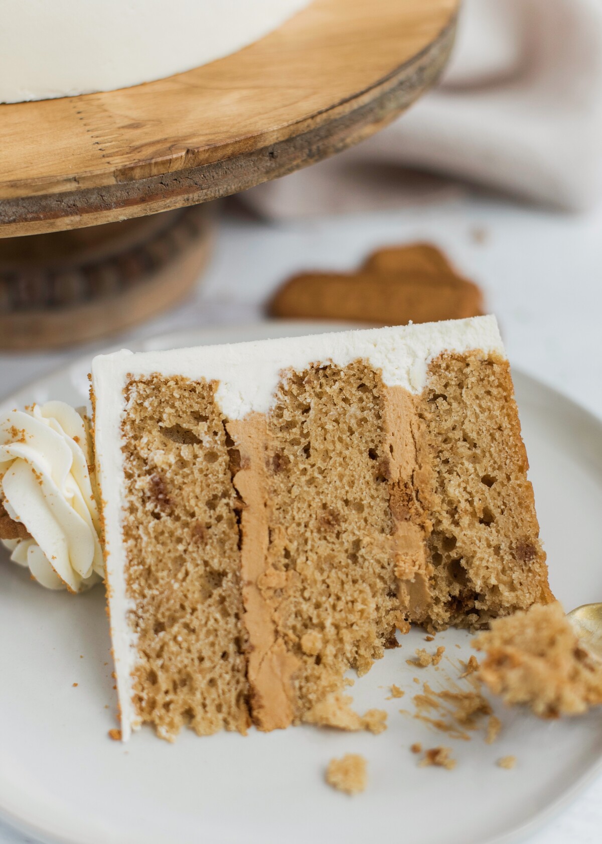 Slice of cake with a bite eaten.