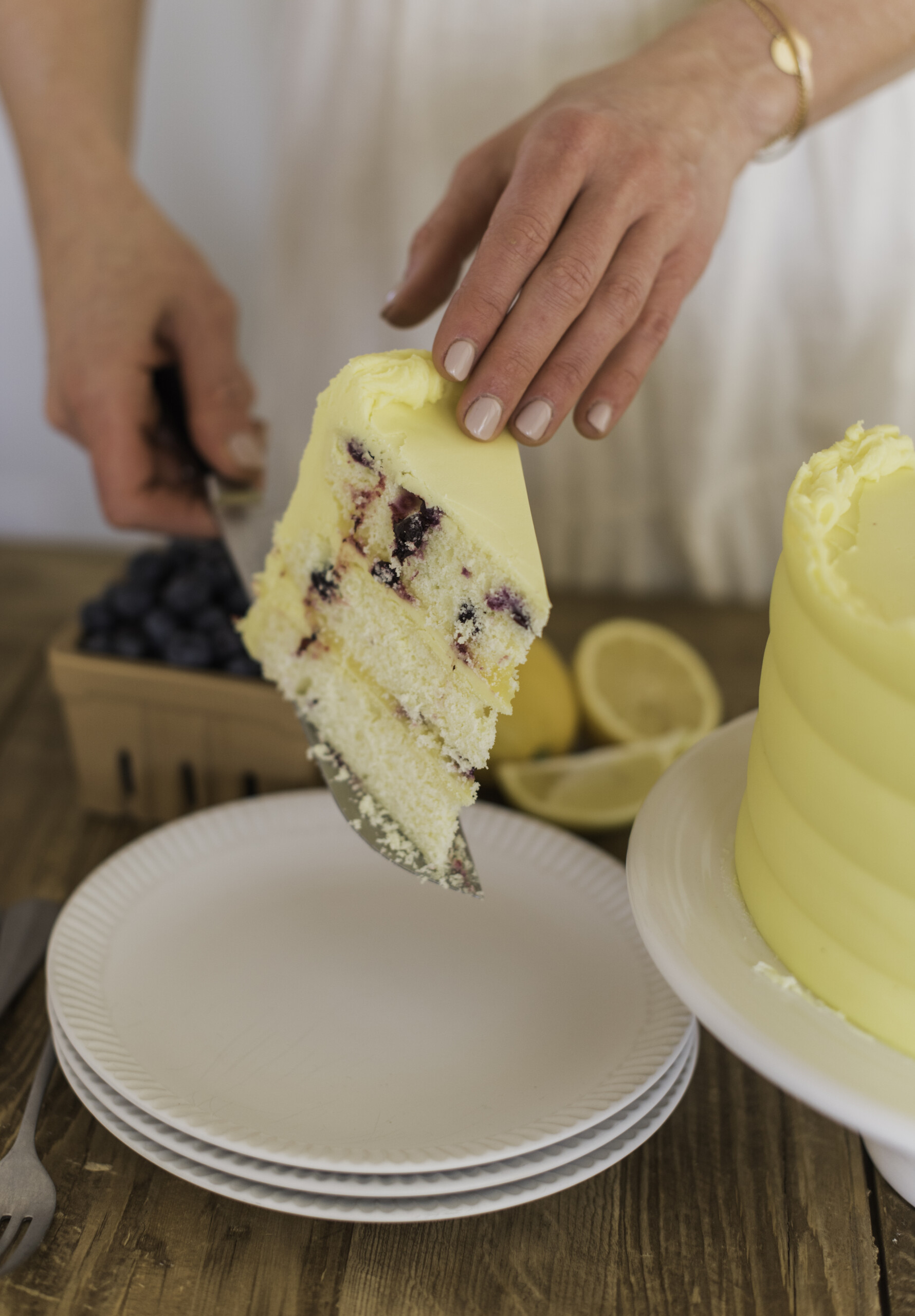 A piece of cake being served on a plate.