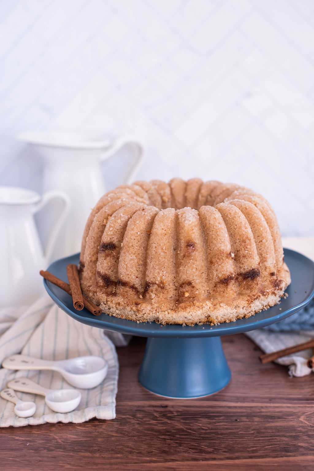 Snickerdoodle Bundt Cake on a cake stand.