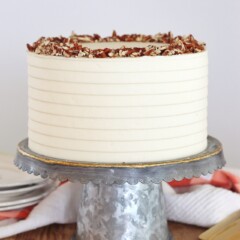 Classic Carrot Cake: incredibly moist, spiced carrot cake layers with a perfectly tangy cream cheese buttercream. #CakebyCourtney #carrotcake #classiccarrotcake #carrotcakewithoutraisins #carrotcakewithoutnuts #carrotcakewithoutnutsorraisins #creamcheesefrosting #creamcheesebuttercream #carrotcakerecipe #thebestcarrotcakerecipe #thebestcarrotcake #eastercake #easterrecipe #easterdessert