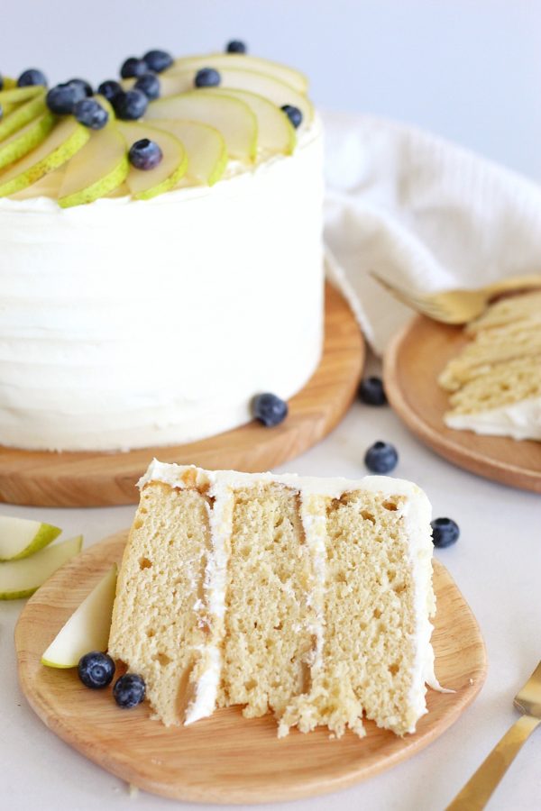 Honey Pear Upside Down Cake - layers of honey butter cake baked with caramelized pears and smothered in a honey cream cheese frosting #cakebycourtney #honeycake #buttercake #pearcake #pears #cake #easycakerecipe #upsidedowncake #cakebycourtney #honeypearupsidedowncake