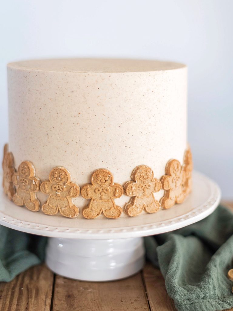 Gingerbread Cookie Cake - gingerbread cake layers with boiled milk frosting, gingersnap cookies and gingersnap buttercream. #gingerbread #gingersnap #boiledmilkfrosting #christmascake #bestchristmascakes #bestholidaycakes #holidaycakes #bestholidaydesserts #holidaydessertideas #holidaycakerecipe #christmascakerecipes #gingerbreadcake #gingersnapcookie