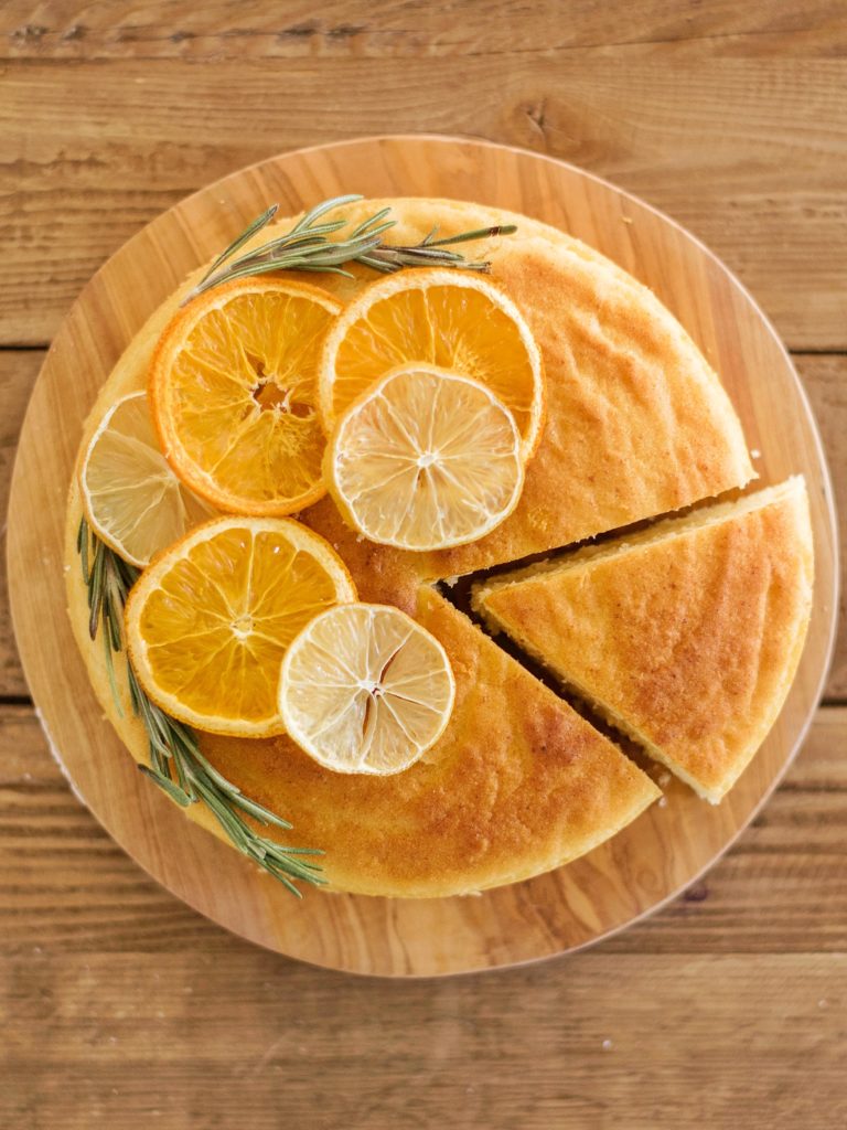 Citrus Olive Oil Cake - tender and moist ricotta olive oil cake layers with lemon and orange zests. #holidaycake #oliveoilcake #holidaycakerecipes #christmascake #bestchristmascakes #bestchristmasdesserts #holidaydessertideas #christmascakeideas #christmascakerecipe #oliveoilcakerecipe