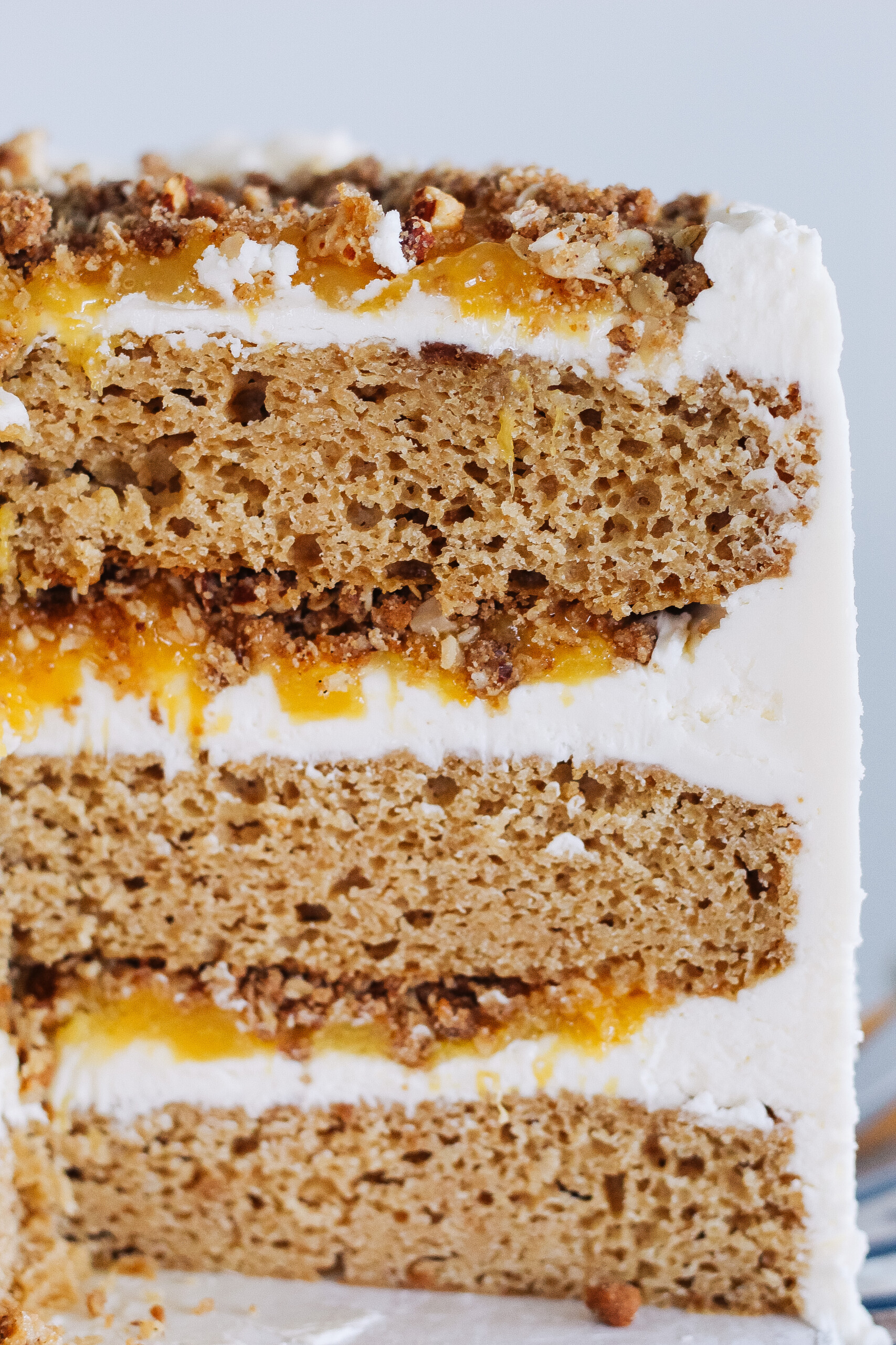 Close up picture of a cake with peach filling.