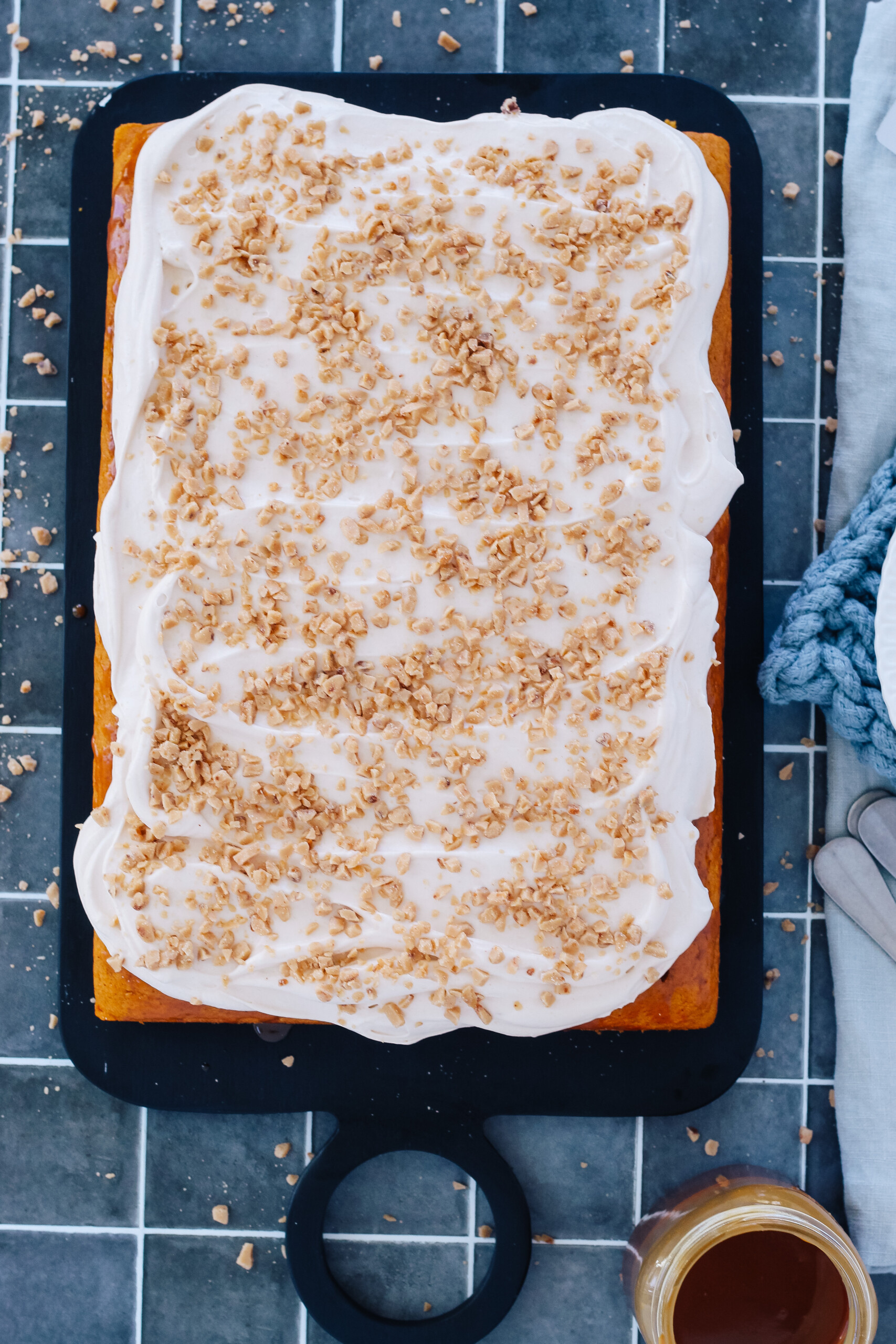 Sheet cake on a cutting board.