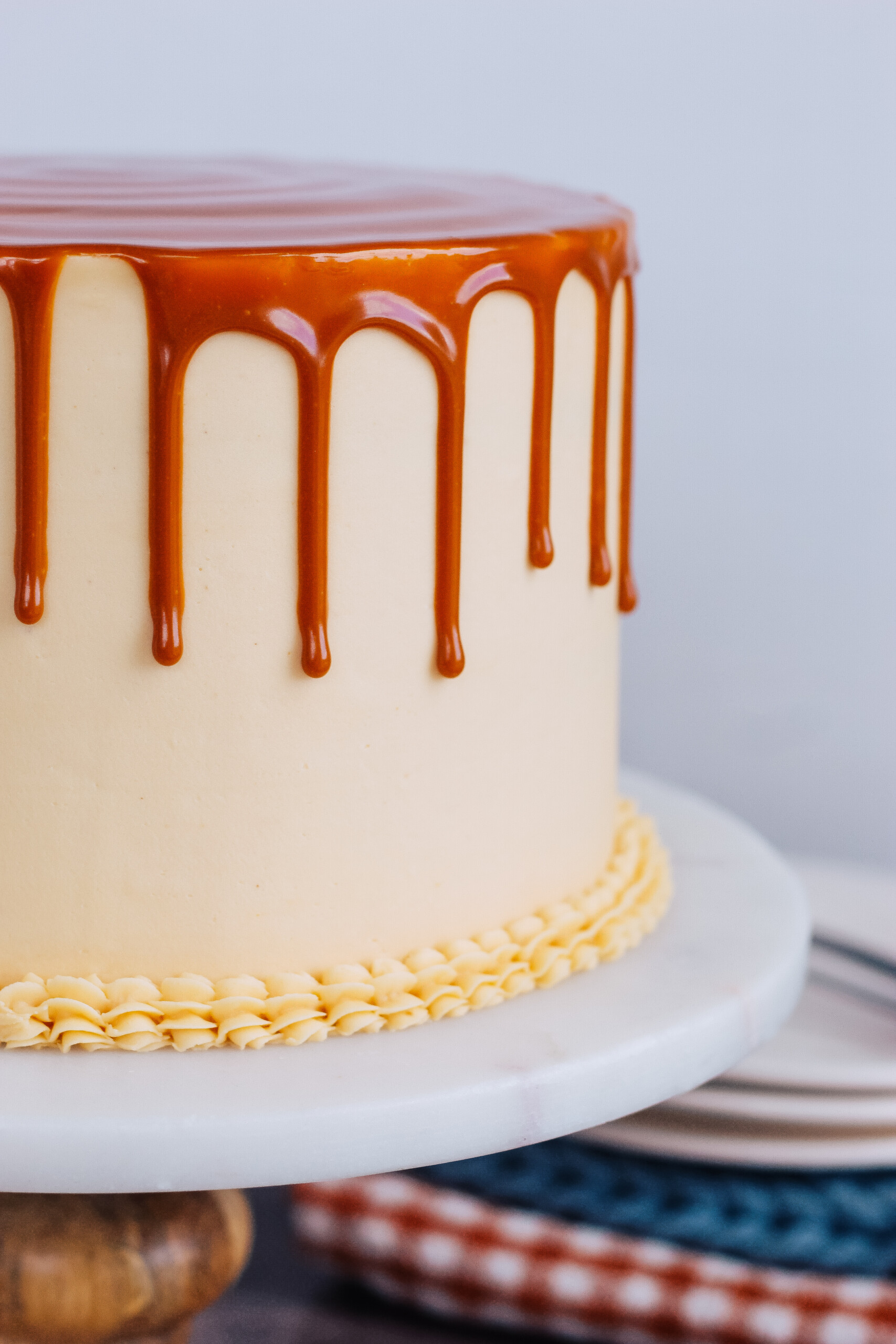 Caramel drip on a cake.