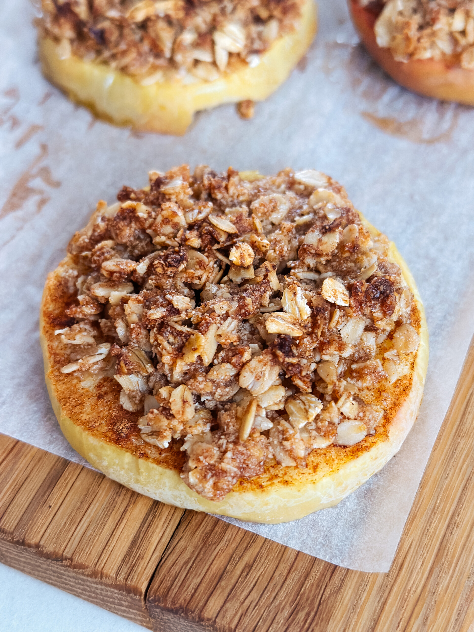 Baked apple with cinnamon oat crumble on top.