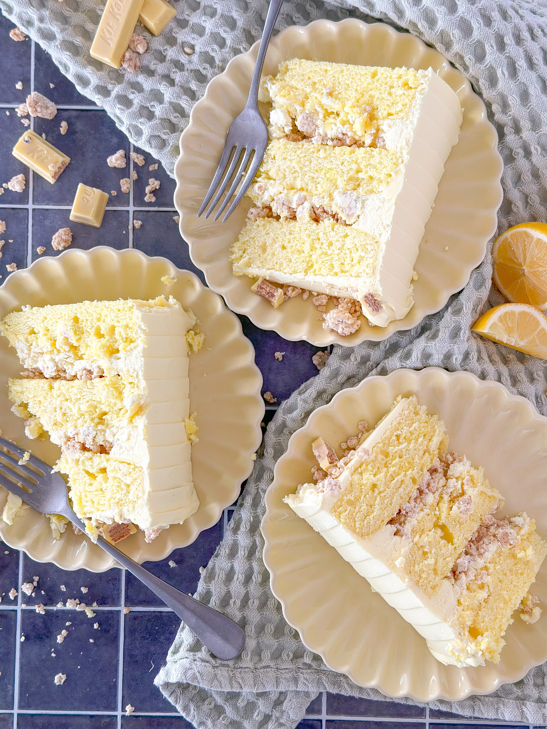 Slices of cake on plates on a table.