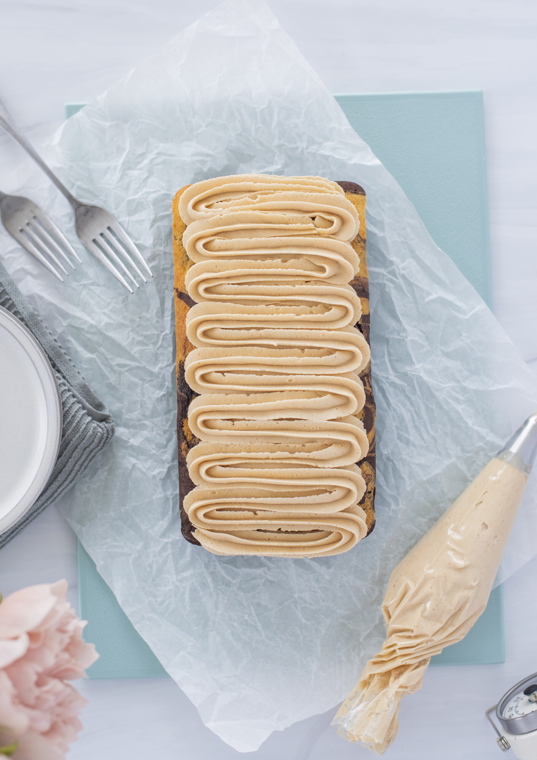 Top view of a cake with buttercream.