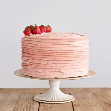 the best cake using strawberry buttercream. www.cakebycourtney.com