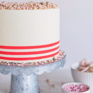 White Chocolate Peppermint Pretzel Cake #peppermintcake #christmascake #holidaycake #cakebycourtney